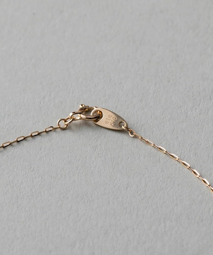 ete K10　イエローゴールド　クロスネックレス ete（エテ）の「○[ファントゥージュエリー] クロス ネックレス